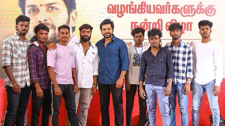 <div class="paragraphs"><p>Actor Karthi with poses with his fans.</p></div>
